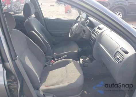 2004 Kia Rio z USA, uszkodzony, nr VIN KNADC125346352447